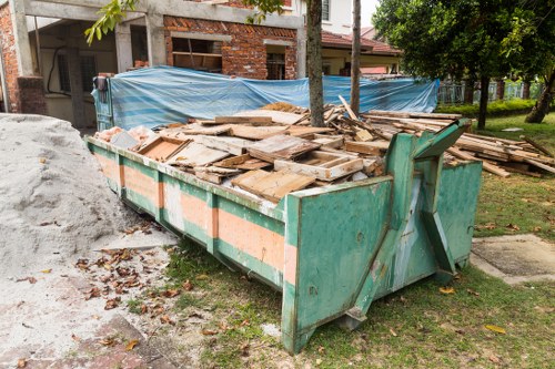 Professional house clearance team working in a Putney home